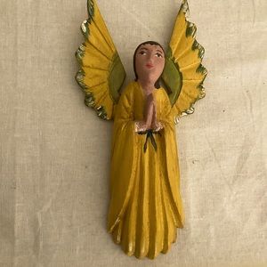 Beautiful hand carved angel. One of a kind.